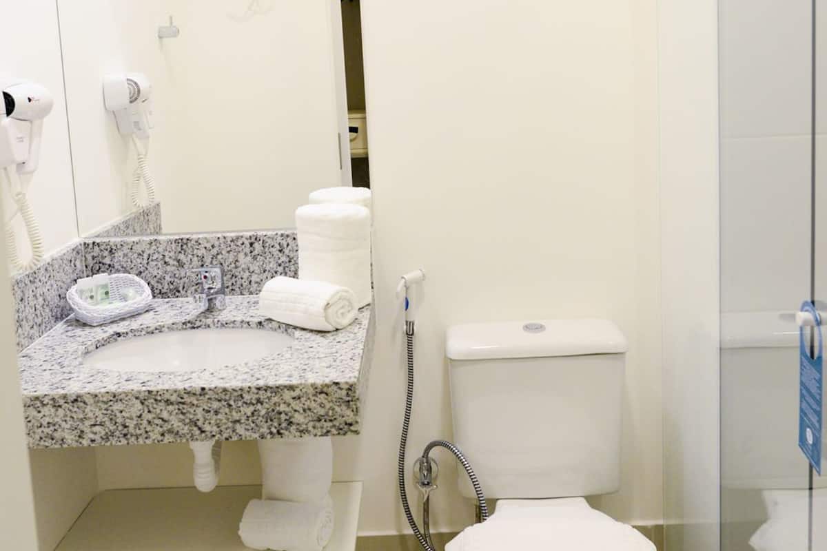 shower, eco-friendly toiletries, hair dryer, towels