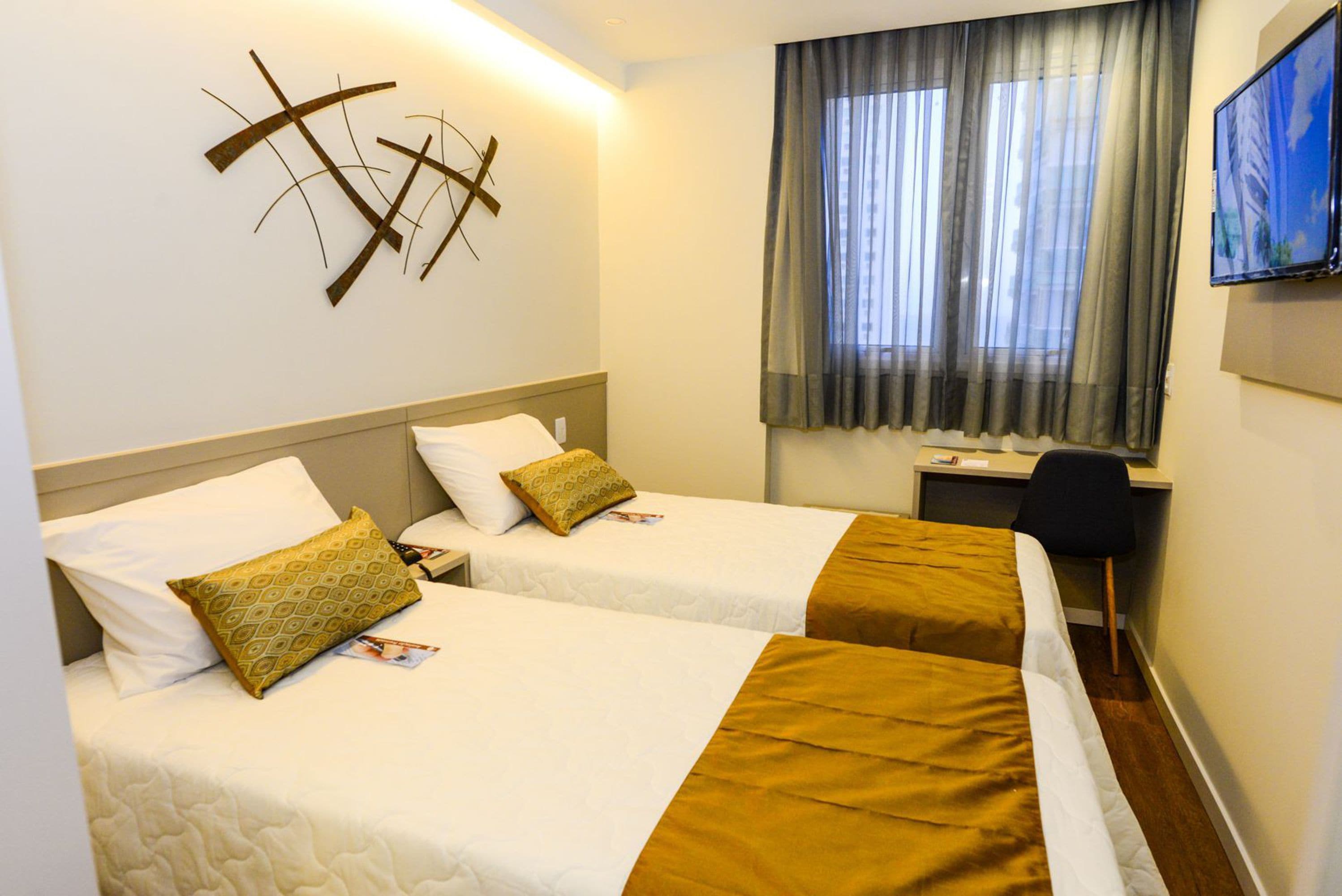 twin room | minibar, in-room safe, desk, soundproofing