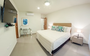 Deluxe Condo, 2 Bedrooms, Accessible, Courtyard Area | 2 bedrooms, in-room safe, iron/ironing board, free WiFi