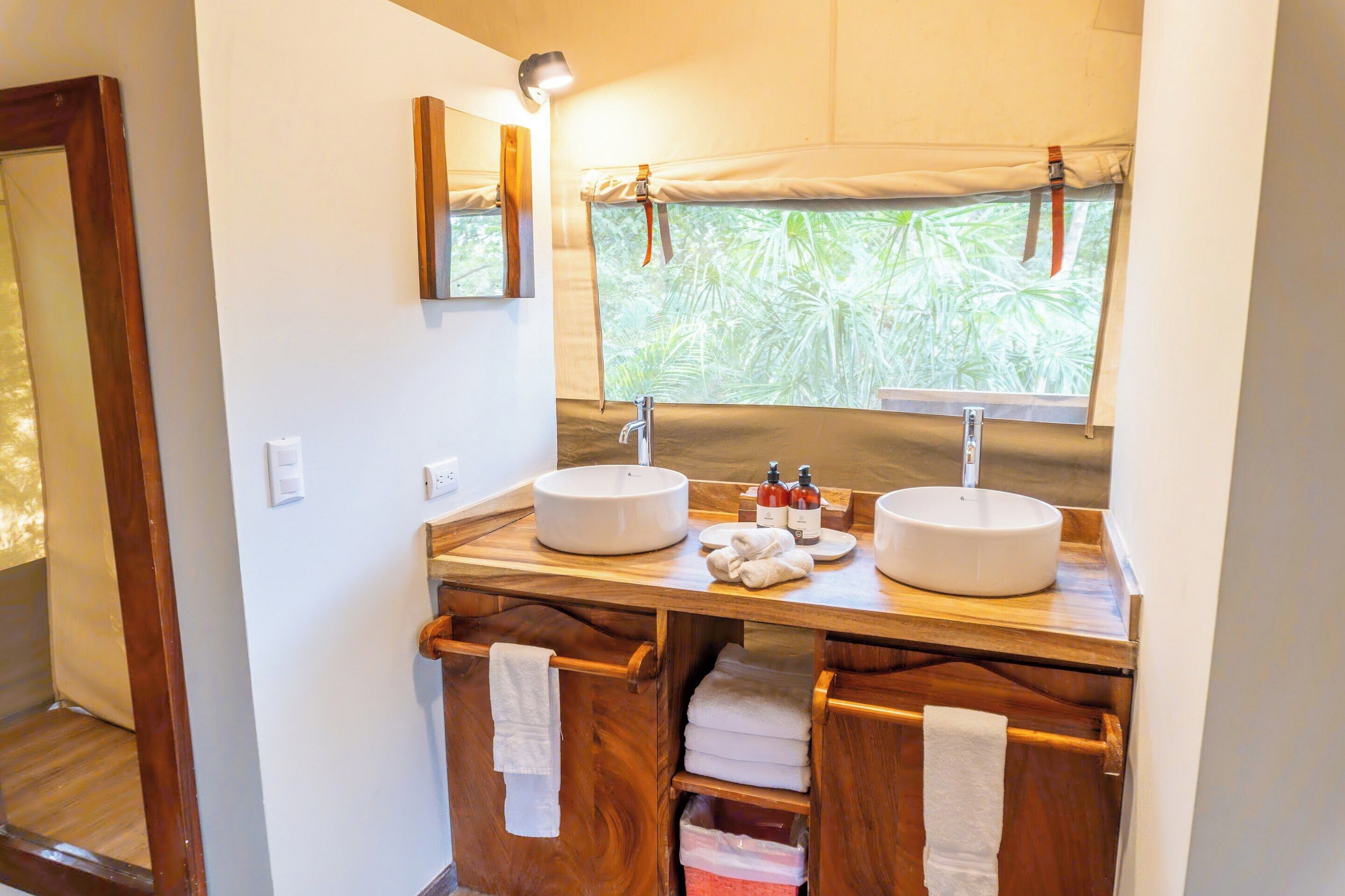 premium tent ocean view king bed | bathroom | shower, free toiletries, hair dryer, towels