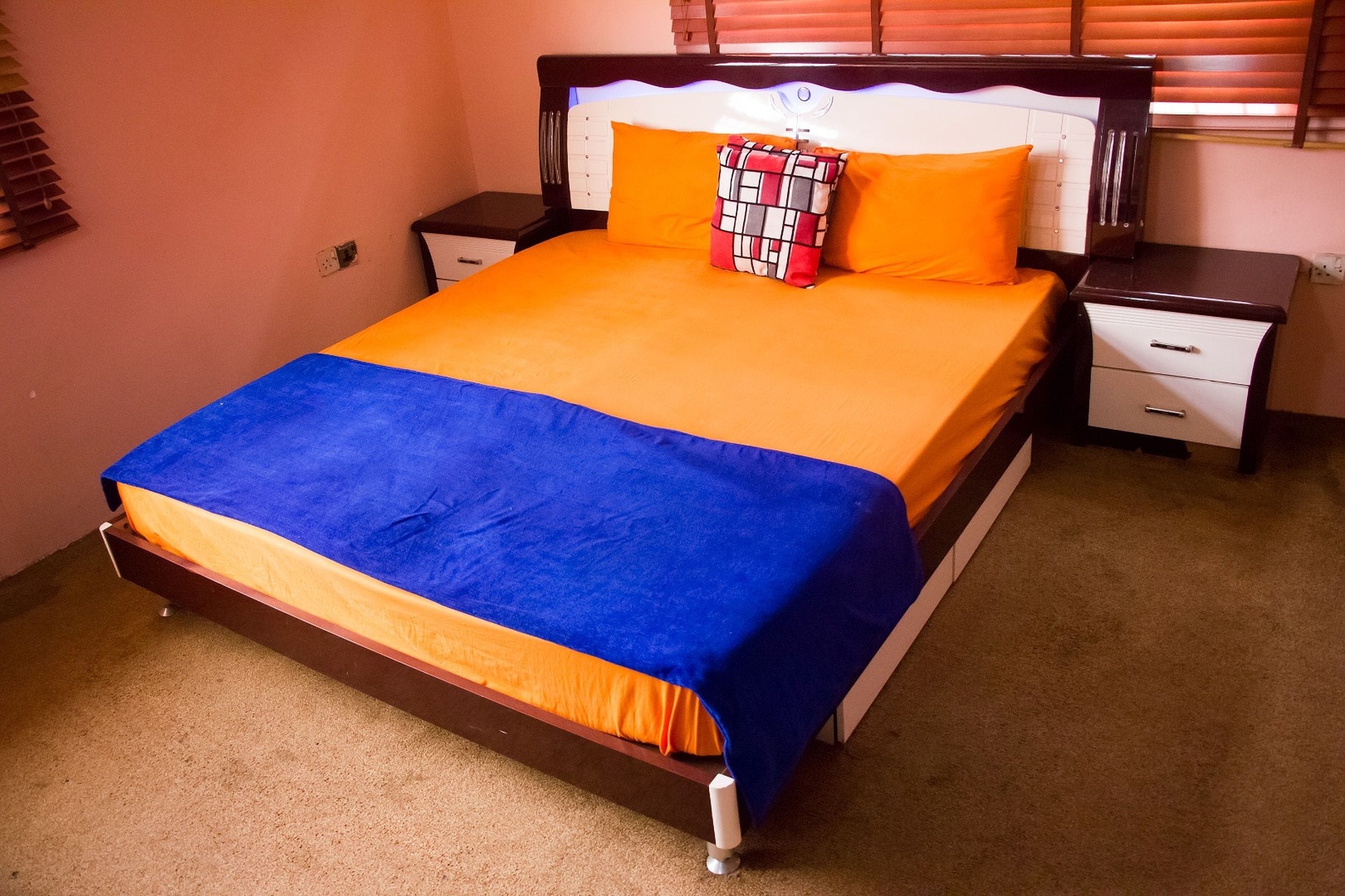 Desk, laptop workspace, bed sheets