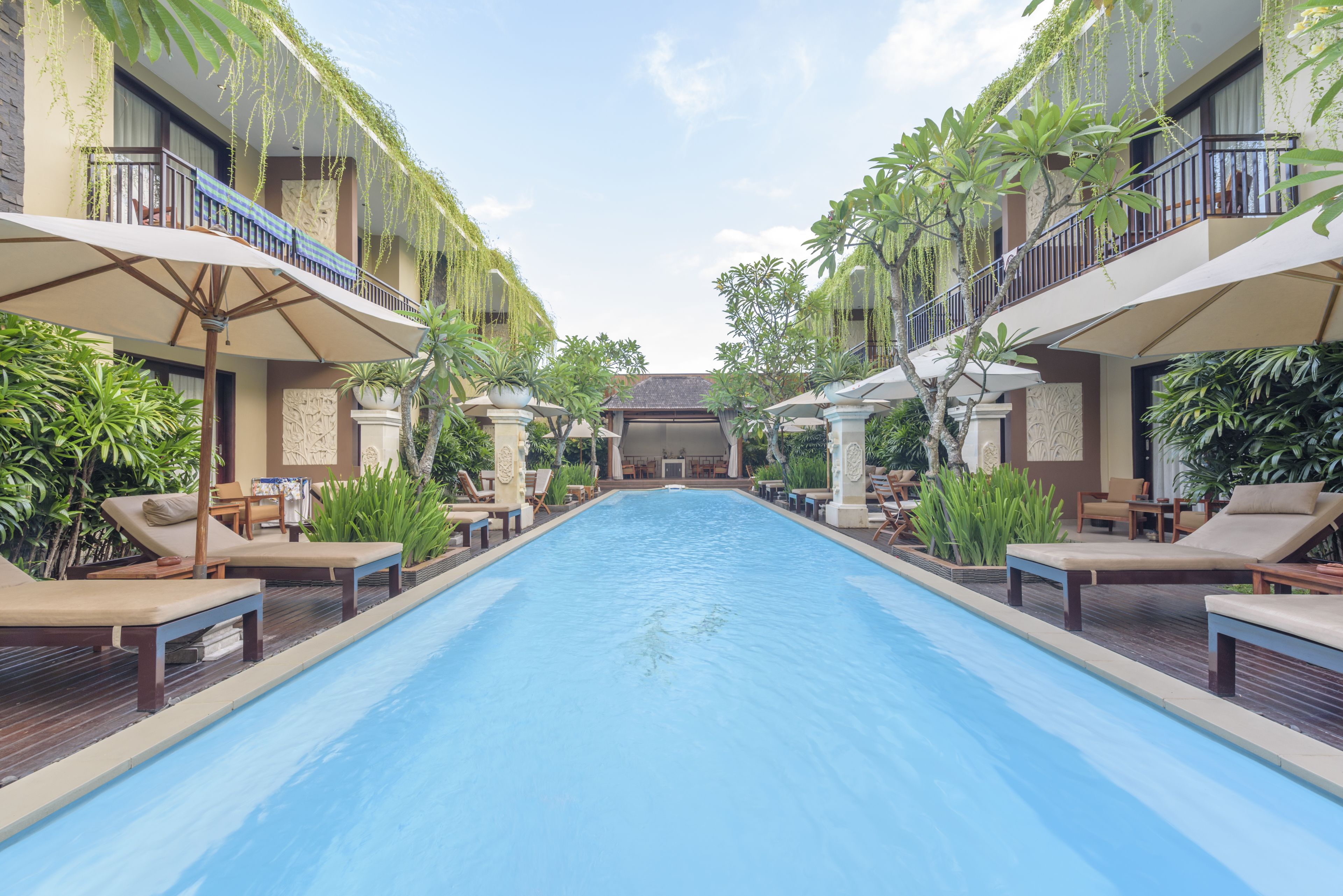 outdoor pool, open 7:00 am to 9:00 pm, pool umbrellas, pool loungers