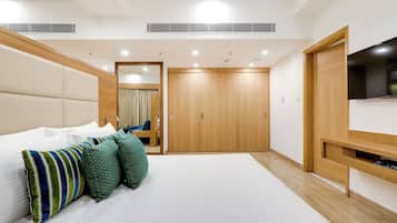 Executive Suite, 1 Bedroom | In-room safe, desk, blackout drapes, iron/ironing board