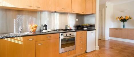 Suite, 1 Bedroom | Private kitchenette | Fridge, oven, stovetop, espresso maker