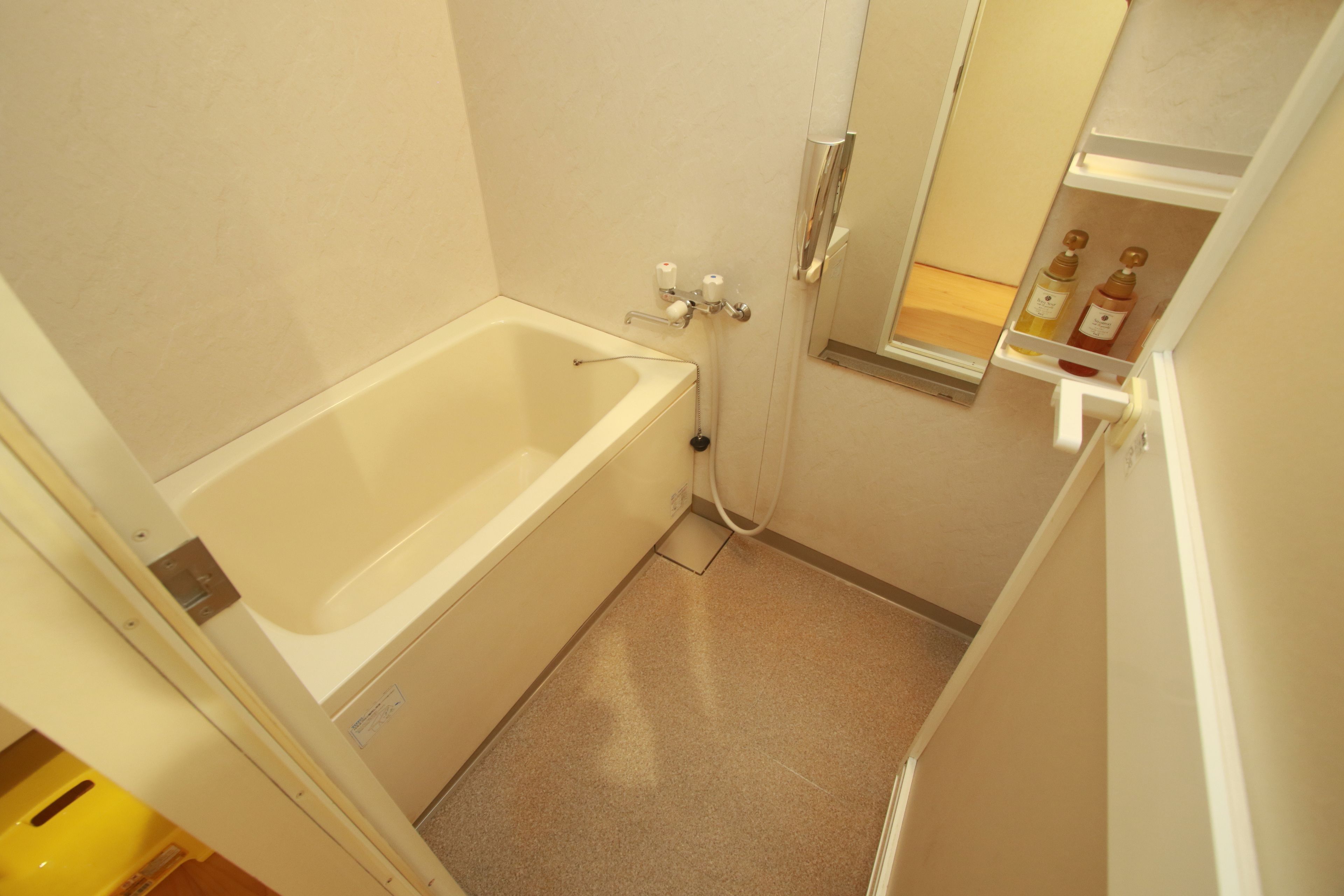 japanese style room | bathroom | hair dryer, slippers, bidet, towels