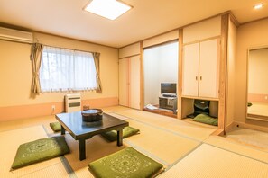 Free WiFi, bed sheets - Petit Hotel Enchante (Hakuba)