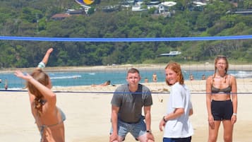 Beach nearby, white sand, beach volleyball
