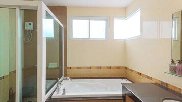 Shower, free toiletries, hair dryer, slippers