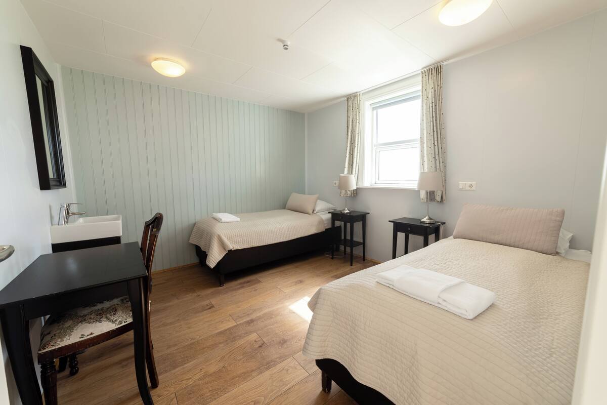Apartamento | Quartos à prova de som, Wi-Fi de cortesia, roupa de cama
