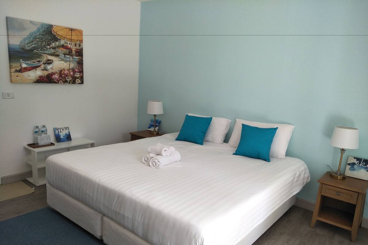 Desk, blackout curtains, soundproofing, rollaway beds