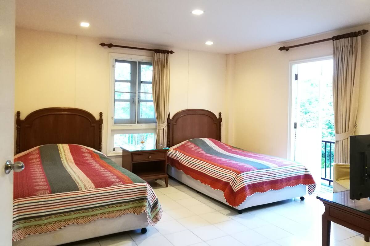 Desk, blackout curtains, soundproofing, rollaway beds