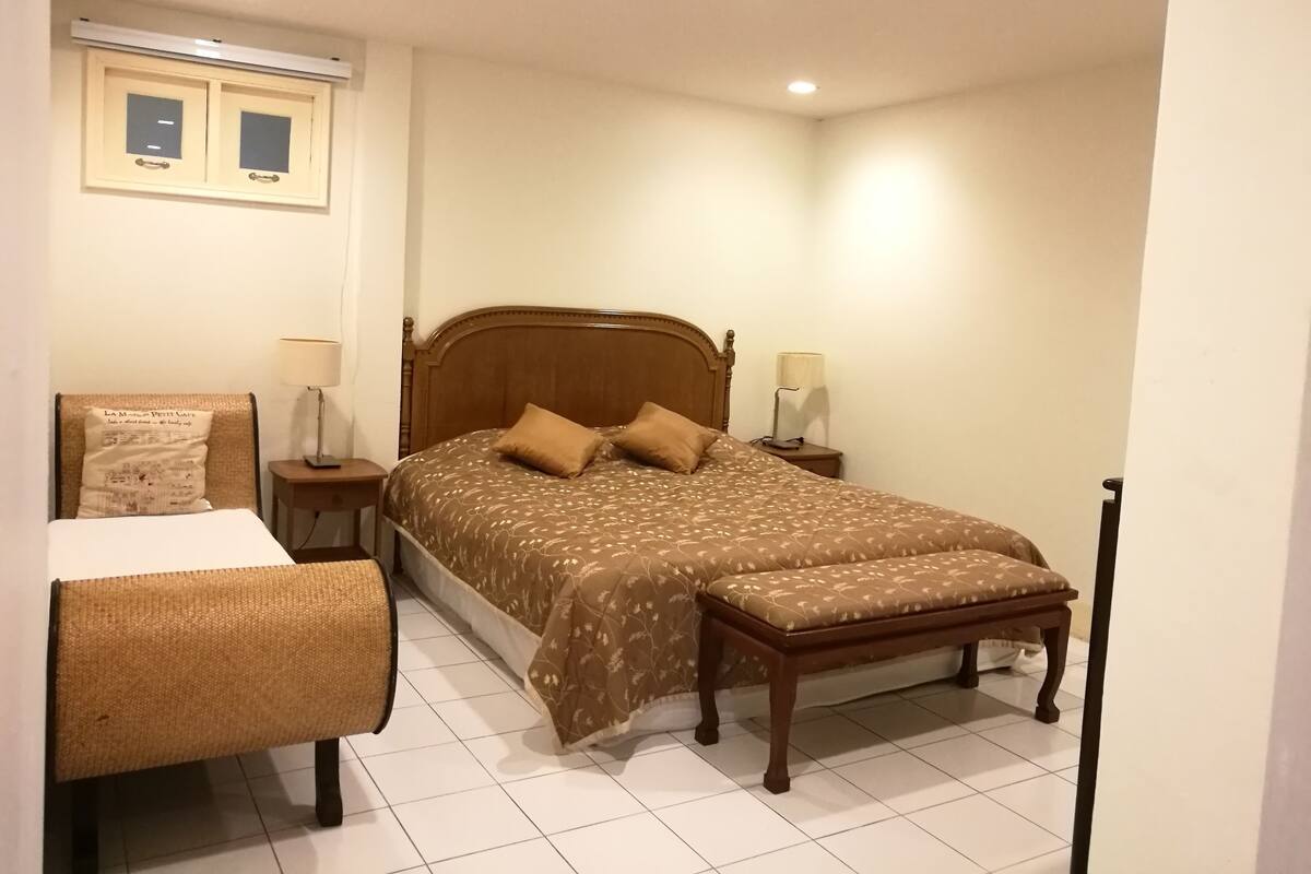 Desk, blackout curtains, soundproofing, rollaway beds