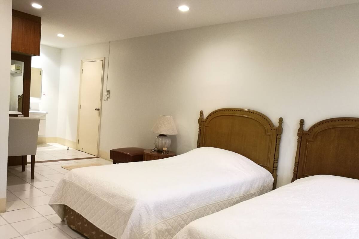 Desk, blackout curtains, soundproofing, rollaway beds