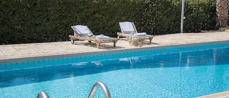 Outdoor pool, pool loungers