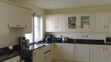 Luxury Cottage | Private kitchen | Full-size fridge, microwave, oven, stovetop