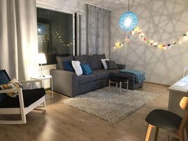 Exclusive Apartment, Sauna, Courtyard View (A 33) | Living area | Flat-screen TV