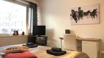 Economy Apartment, 2 Bedrooms, Ground Floor | 1 bedroom, desk, iron/ironing board, free WiFi