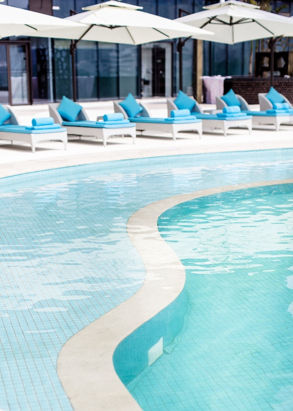 Outdoor pool, pool umbrellas, pool loungers