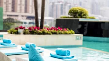 Outdoor pool, pool umbrellas, pool loungers