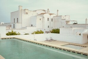 Seasonal outdoor pool, pool umbrellas, pool loungers