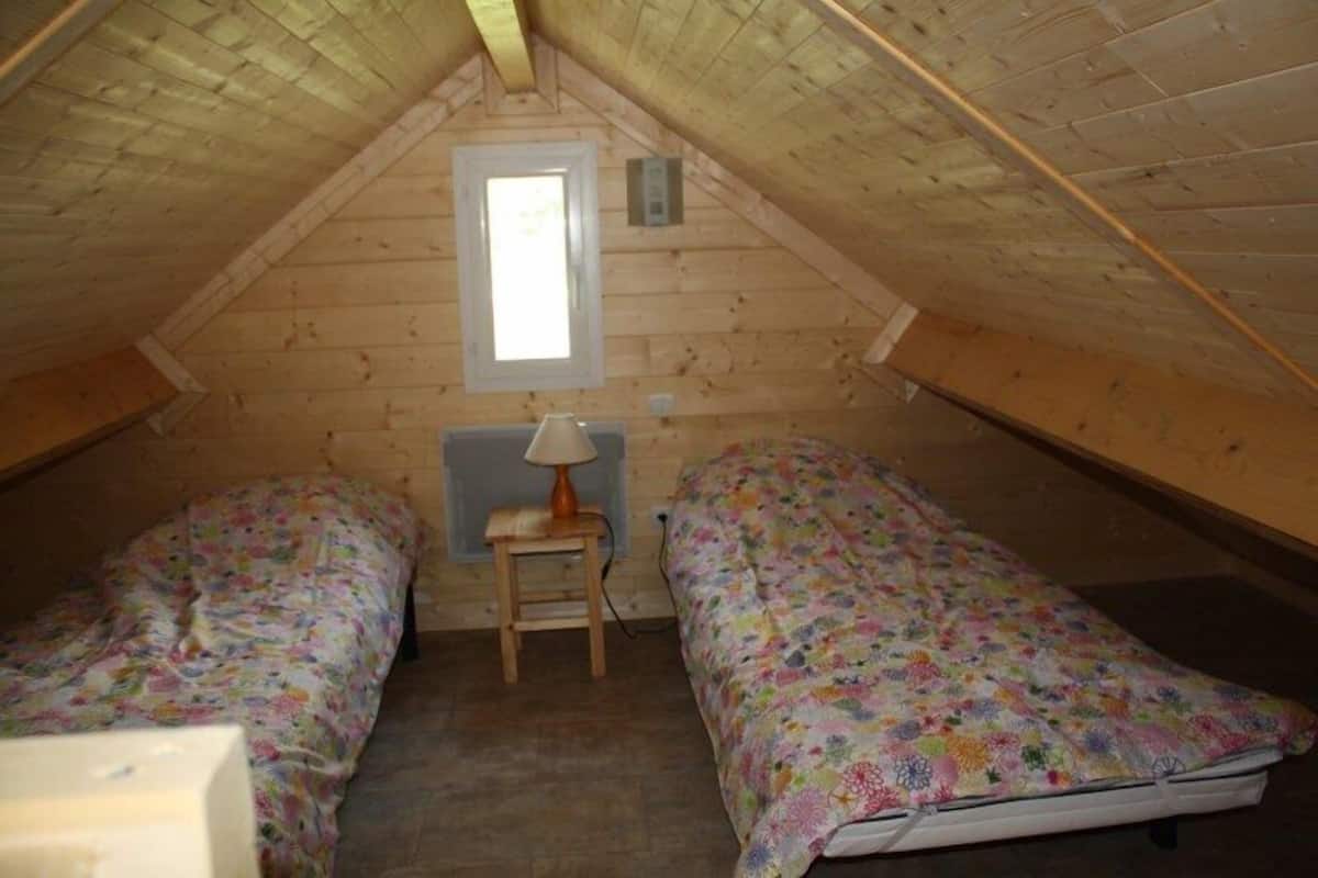 Chalet 2 chambres et 1 mezzanine | Coffres-forts dans les chambres, Wi-Fi gratuit