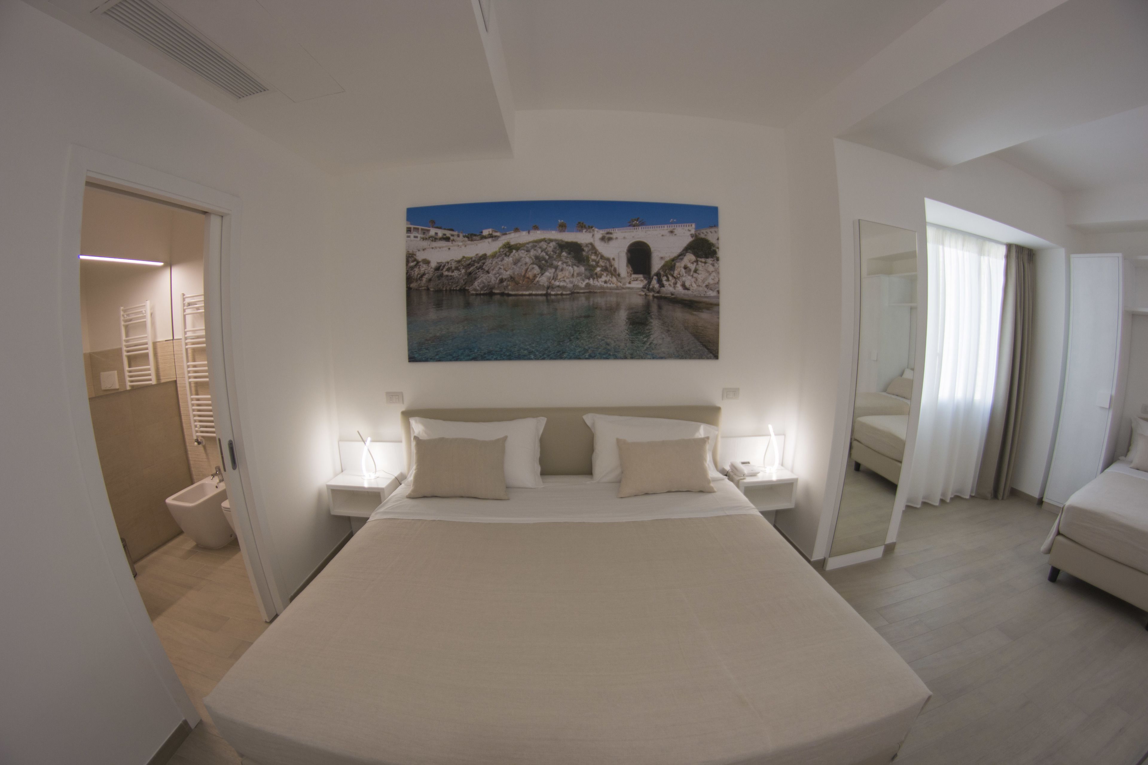 deluxe quadruple room | minibar, in-room safe, desk, free wifi