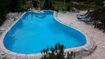 Indoor pool, outdoor pool, pool umbrellas, sun loungers