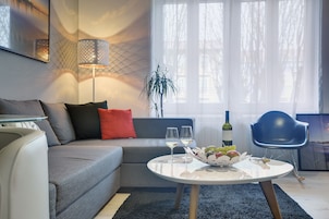 Apartamento, 1 quarto (3) | Área de estar | TV de tela plana