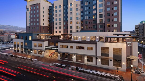 A multi-story hotel with a flat facade, large windows, and a sign indicating it is a Marriott hotel. - Residence Inn by Marriott Boise Downtown City Center (Boise)