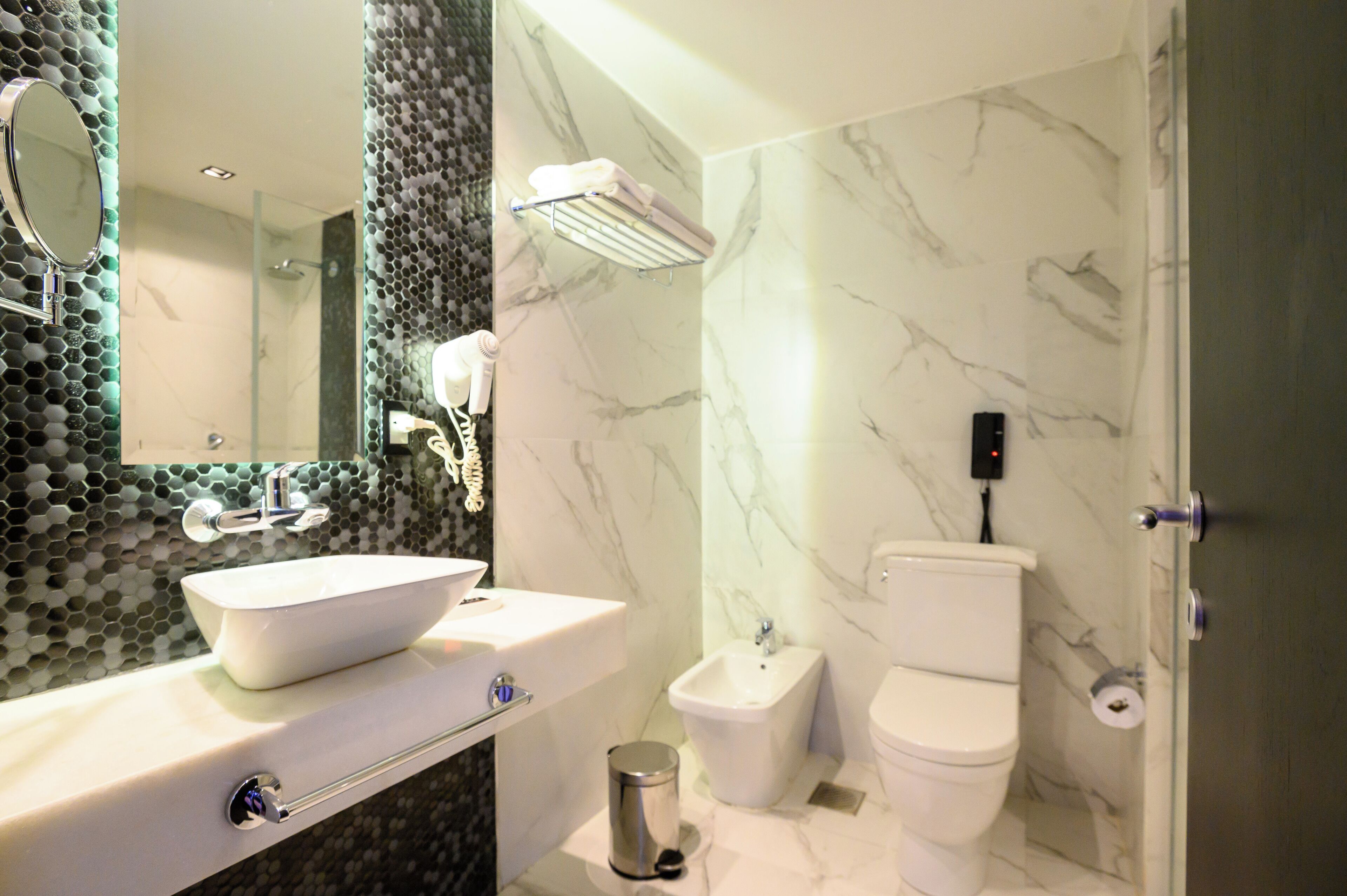 superior room | bathroom | shower, free toiletries, hair dryer, towels