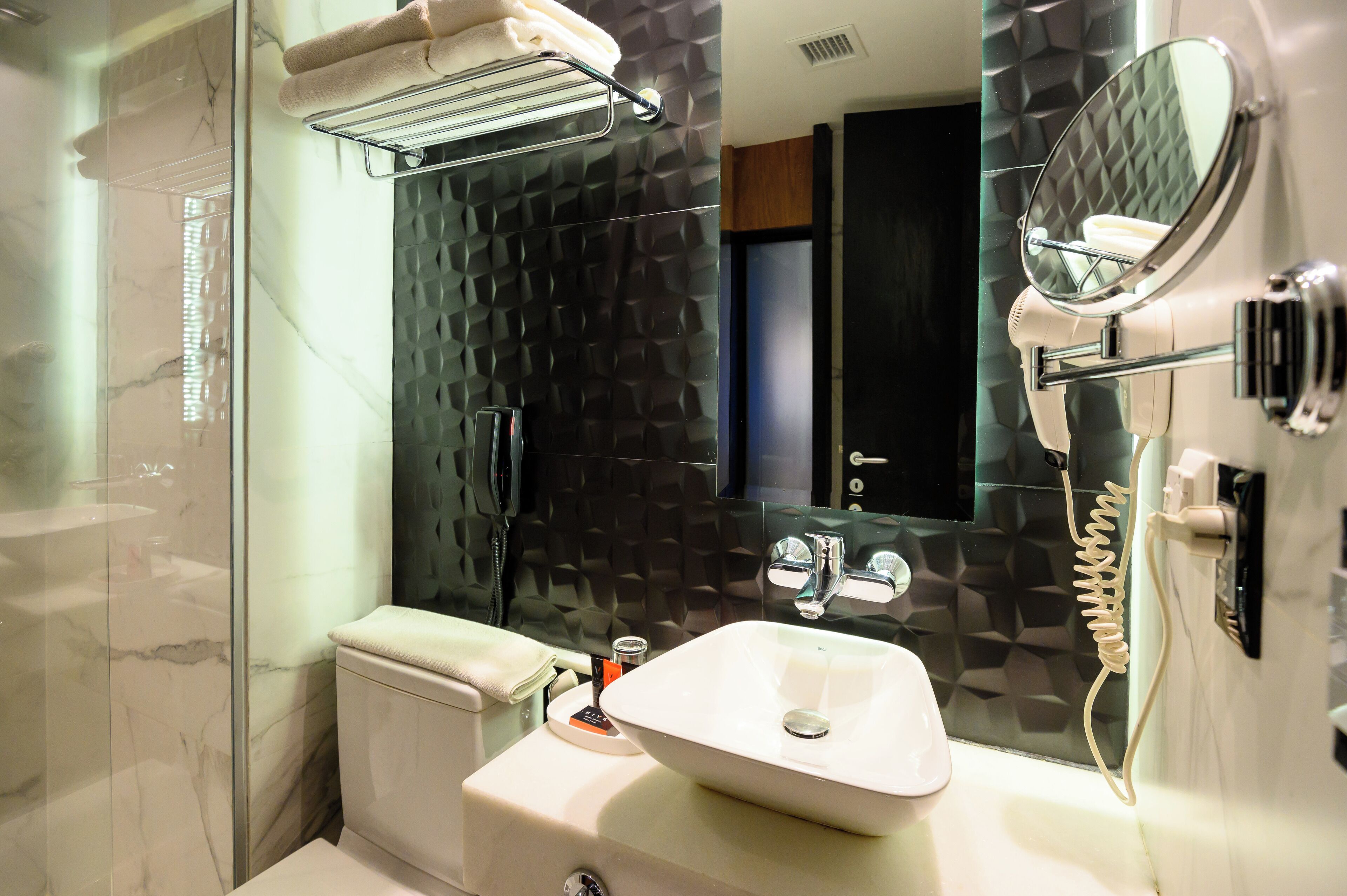 superior room | bathroom | shower, free toiletries, hair dryer, towels