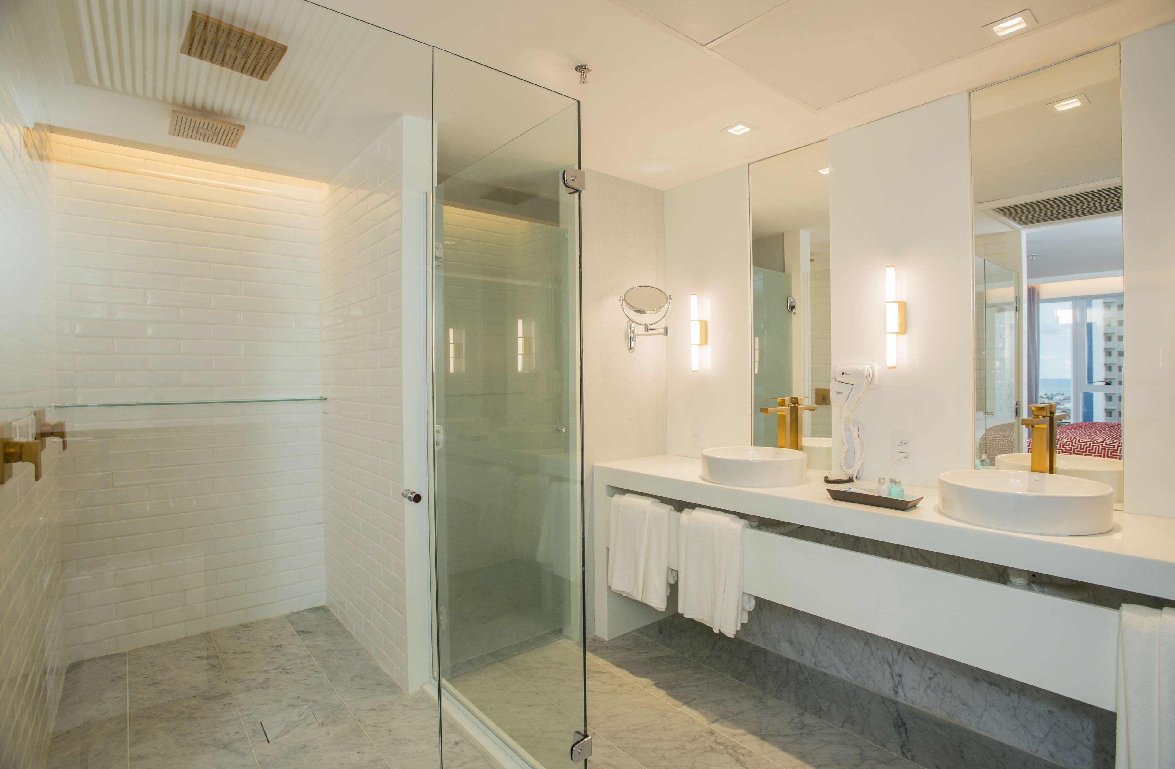 executive suite | bathroom | shower, free toiletries, hair dryer, towels