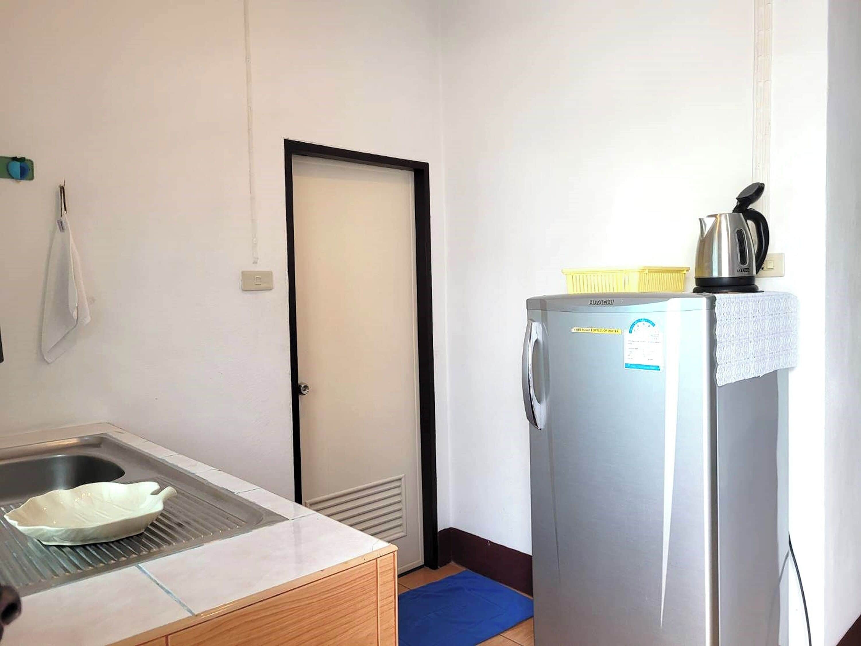 family room with balcony (1 bathroom) | in-room safe, desk, blackout curtains, iron/ironing board