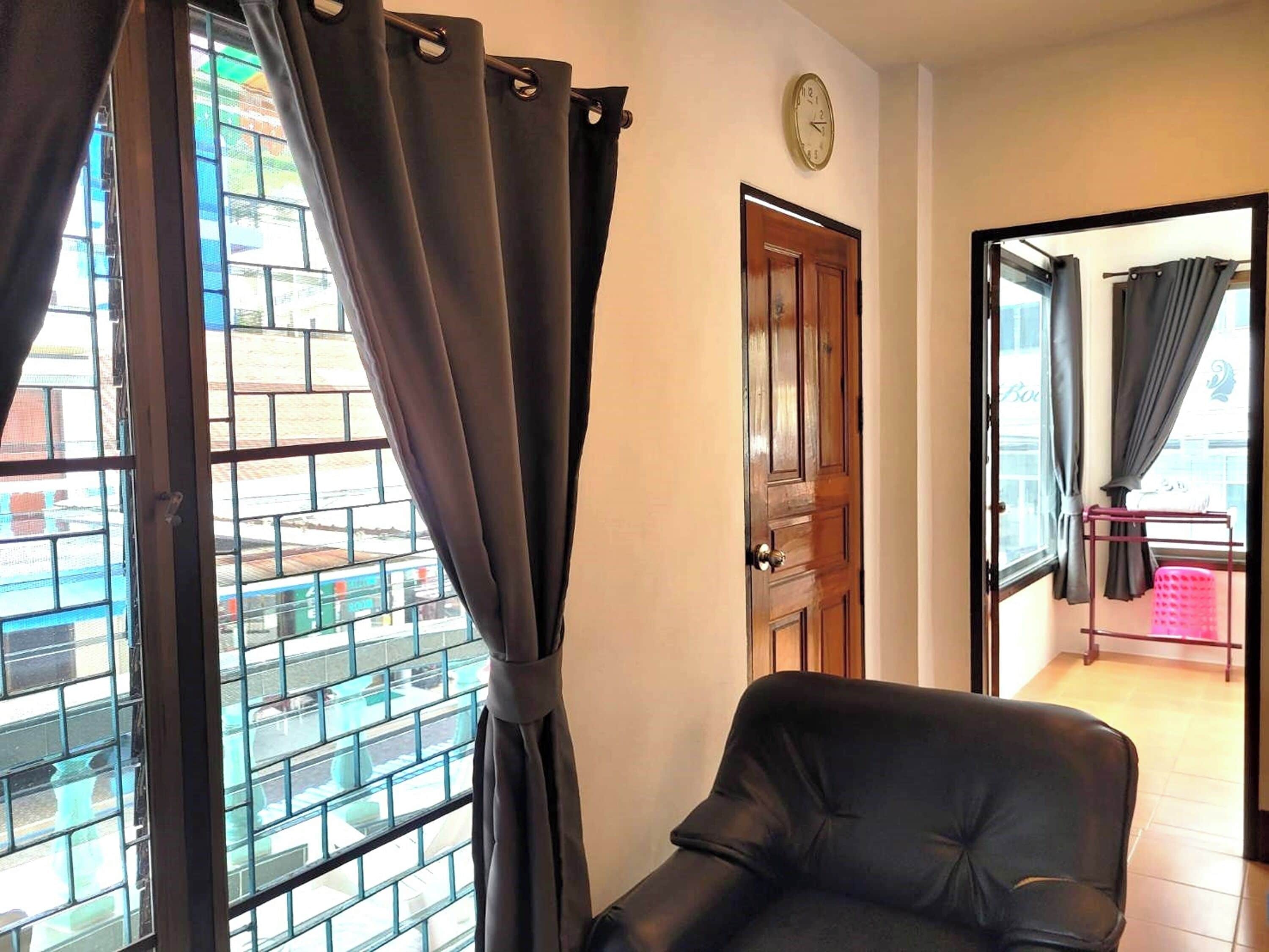 family room with balcony (1 bathroom) | in-room safe, desk, blackout curtains, iron/ironing board