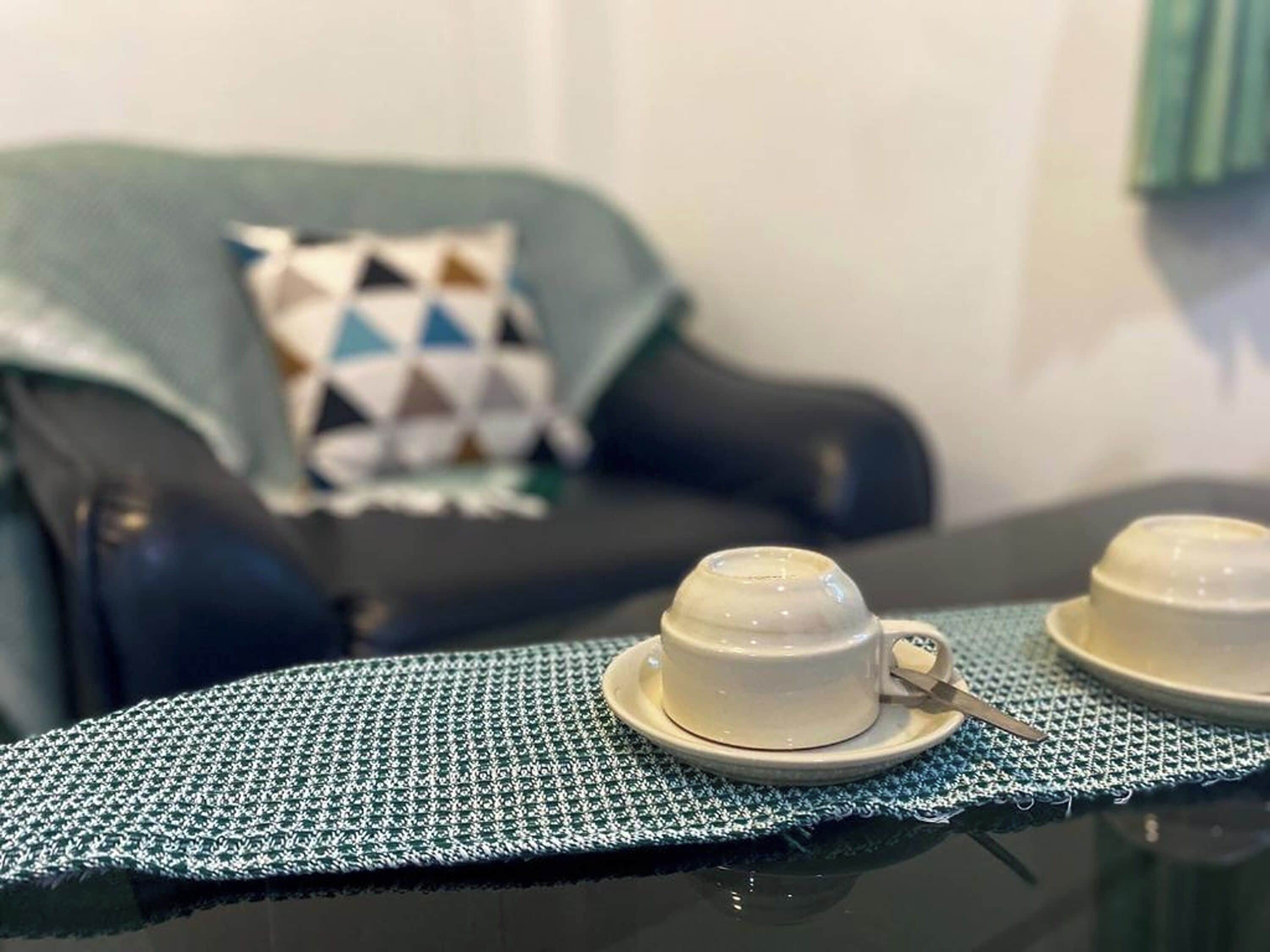 super deluxe room with balcony | in-room safe, desk, blackout curtains, iron/ironing board