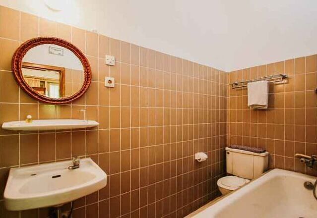 Bathroom | Shower, free toiletries, hair dryer, slippers