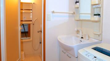 Combined shower/tub
