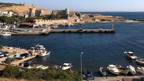 A coastal town with a historic fort, marina, and clear blue sky. - Katina Bozcaada (Bozcaada)