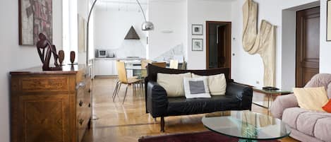 Apartment (1 Bedroom) | Living room | Flat-screen TV