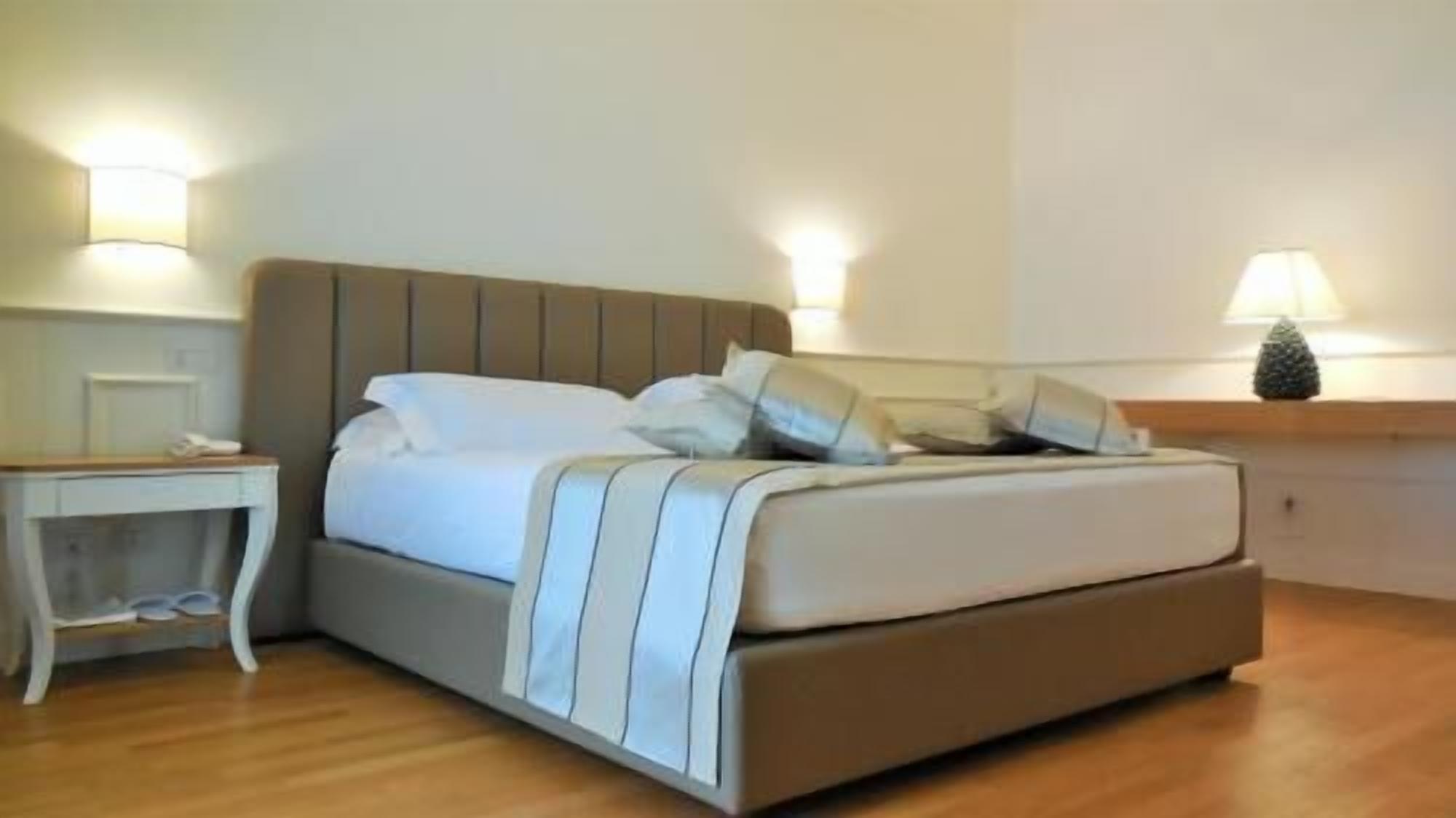 Premium bedding, memory-foam beds, minibar, in-room safe