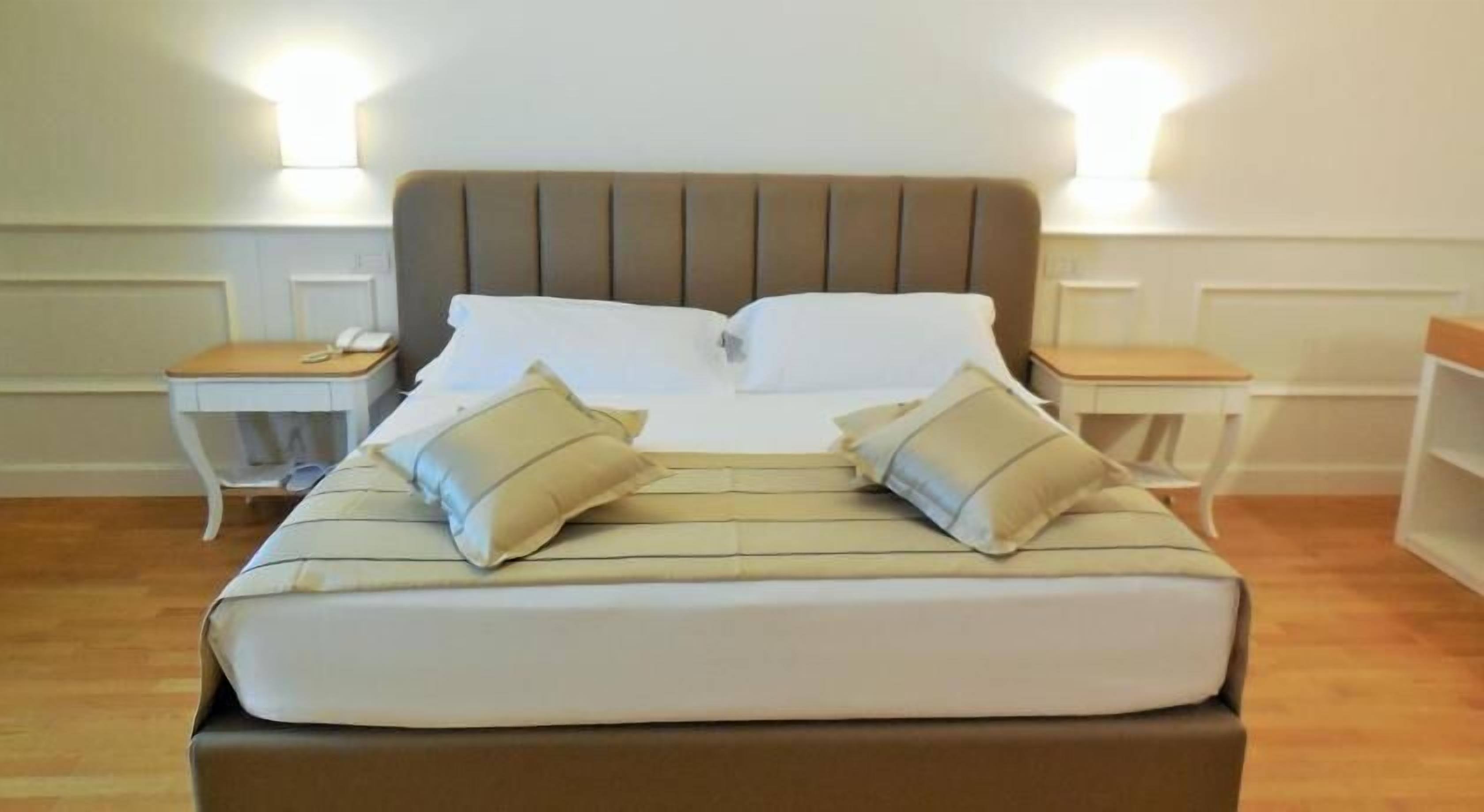 Premium bedding, memory-foam beds, minibar, in-room safe