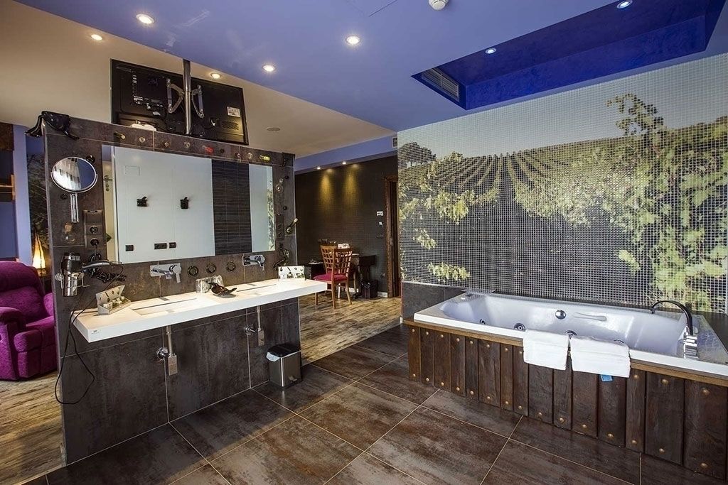 junior suite | bathroom | shower, designer toiletries, hair dryer, towels