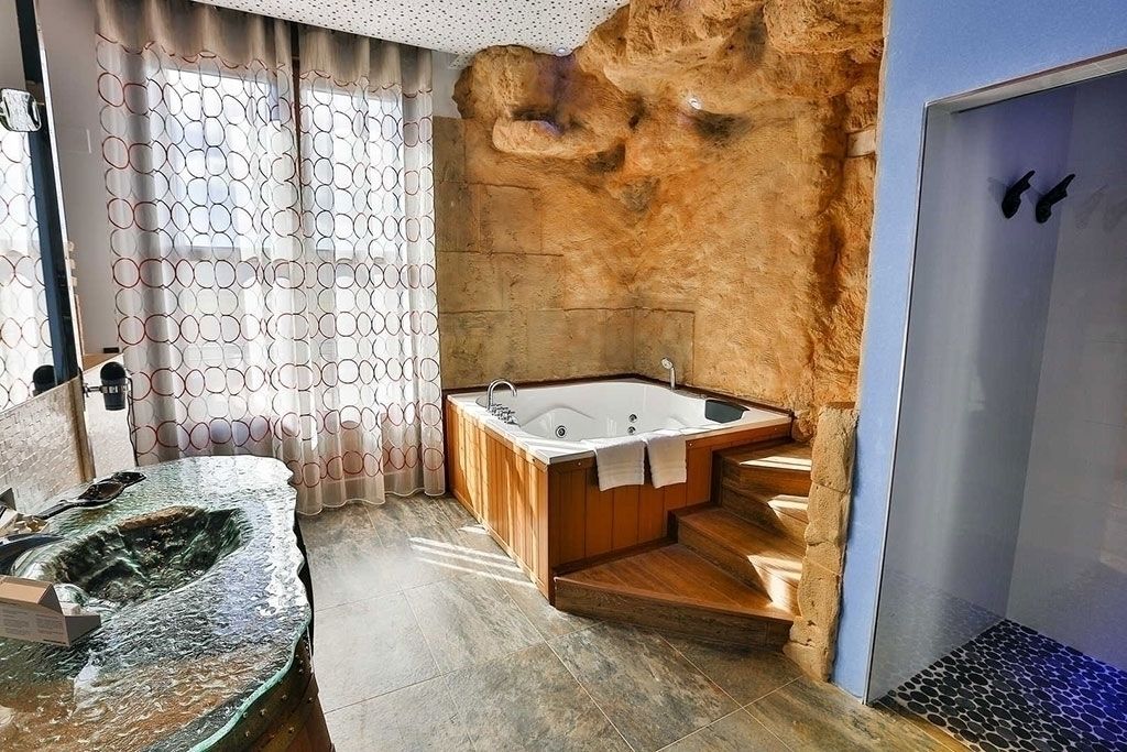 suite | bathroom | shower, designer toiletries, hair dryer, towels