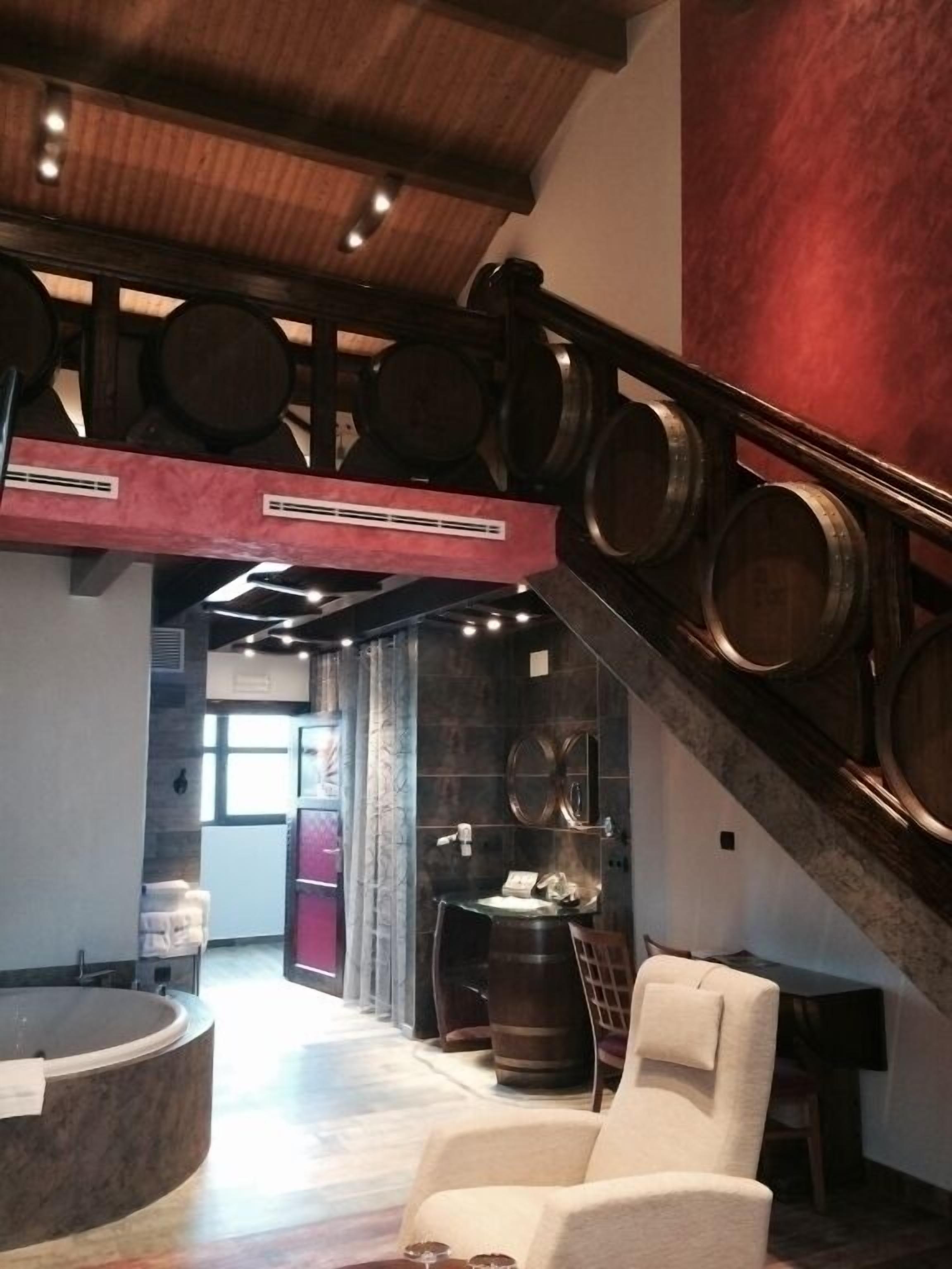 superior suite (duplex) | living area | 42-inch flat-screen tv with cable channels, tv