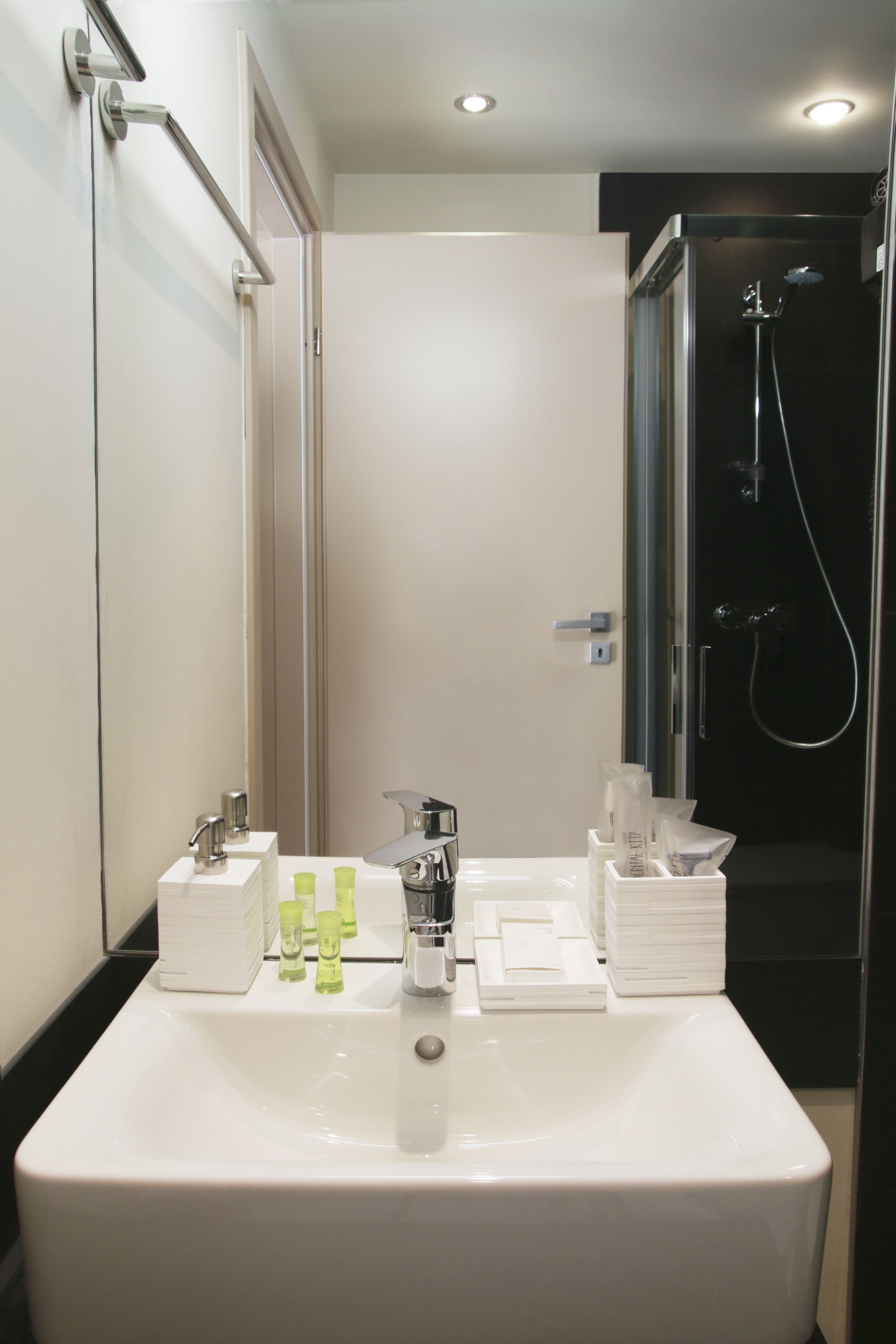 shower, free toiletries, slippers, towels