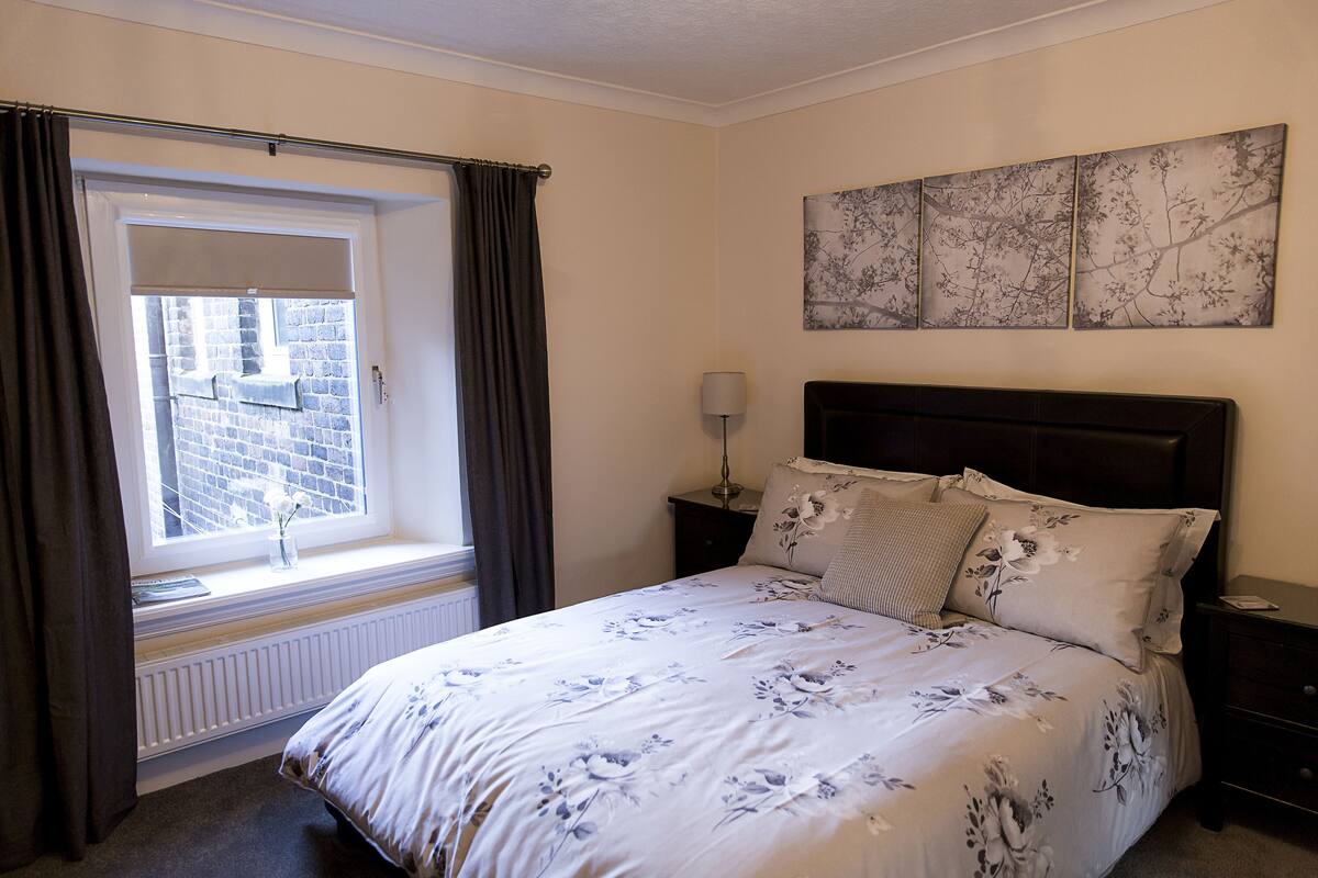Deluxe Double Room (Room 3) | Premium bedding, desk, laptop workspace, iron/ironing board