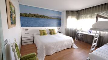 Desk, blackout curtains, free cots/infant beds, rollaway beds