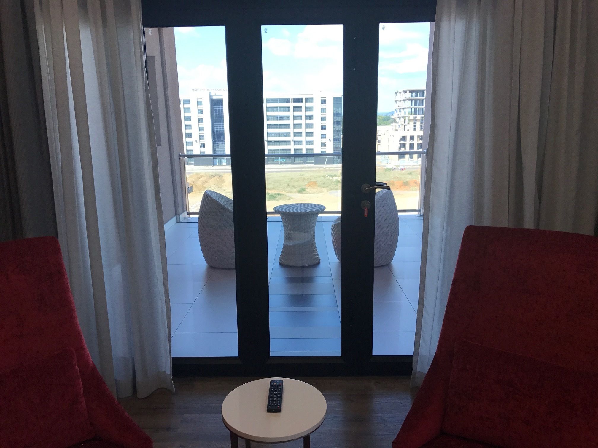 premium room, 1 queen bed, smoking | in-room safe, desk, soundproofing, iron/ironing board