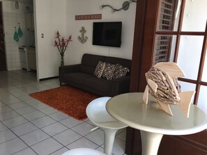 Superior Studio Suite, Ocean View, Beachside | Living room | Flat-screen TV