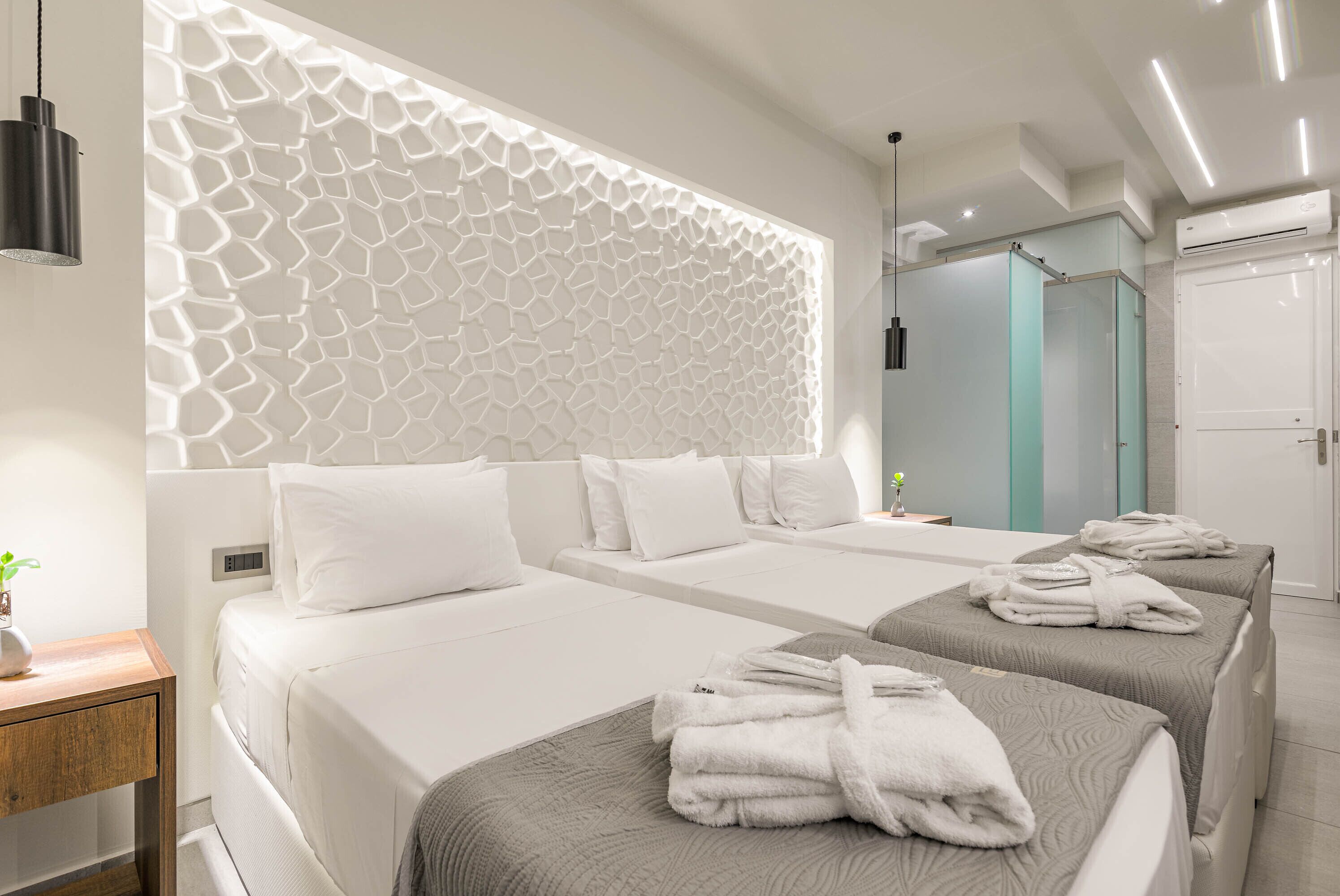 deluxe triple room | in-room safe, iron/ironing board, free wifi, bed sheets